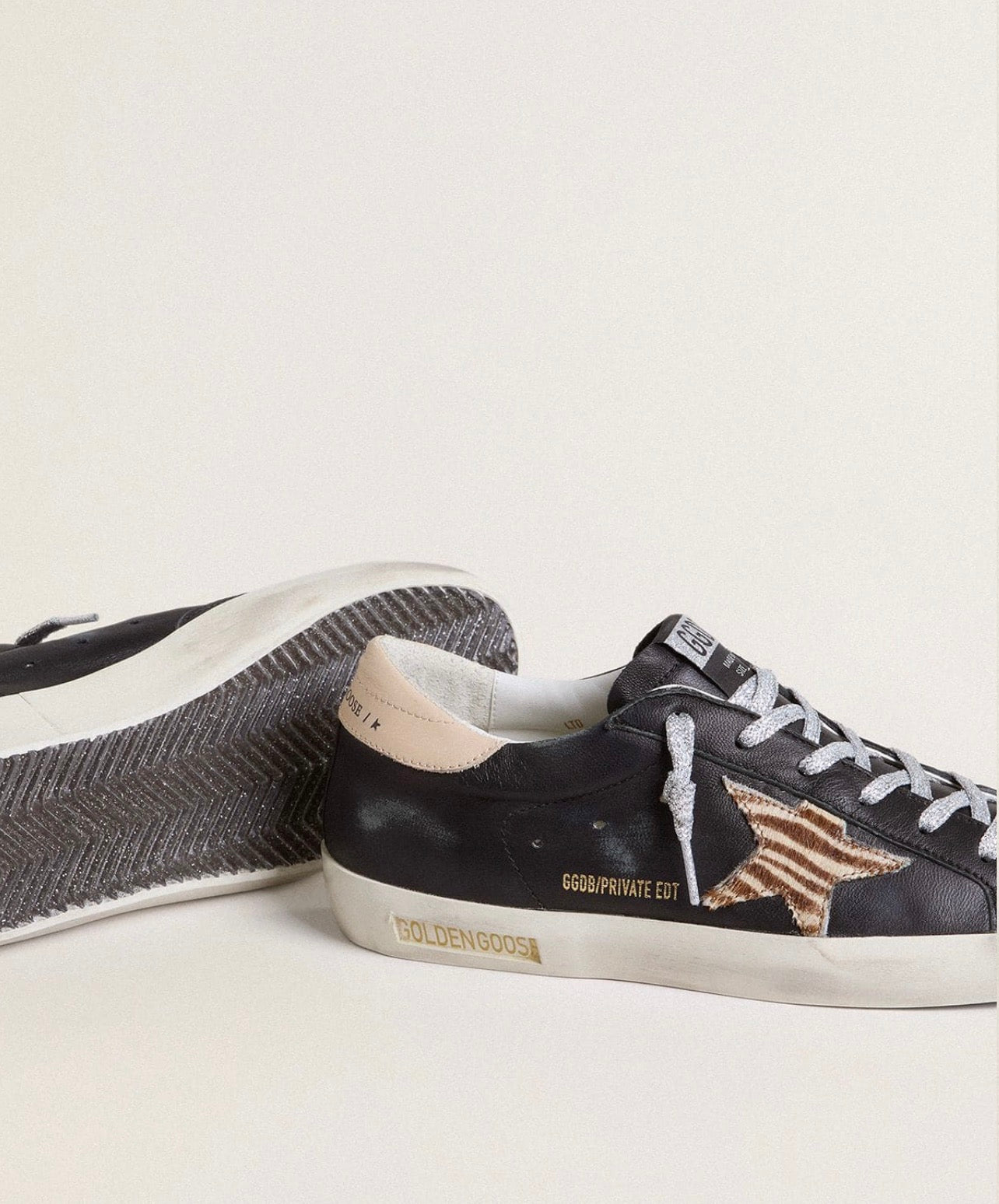 Golden Goose GGDB Women's Super-Star in black nappa leather with zebra-print pony skin star and beige heel tab